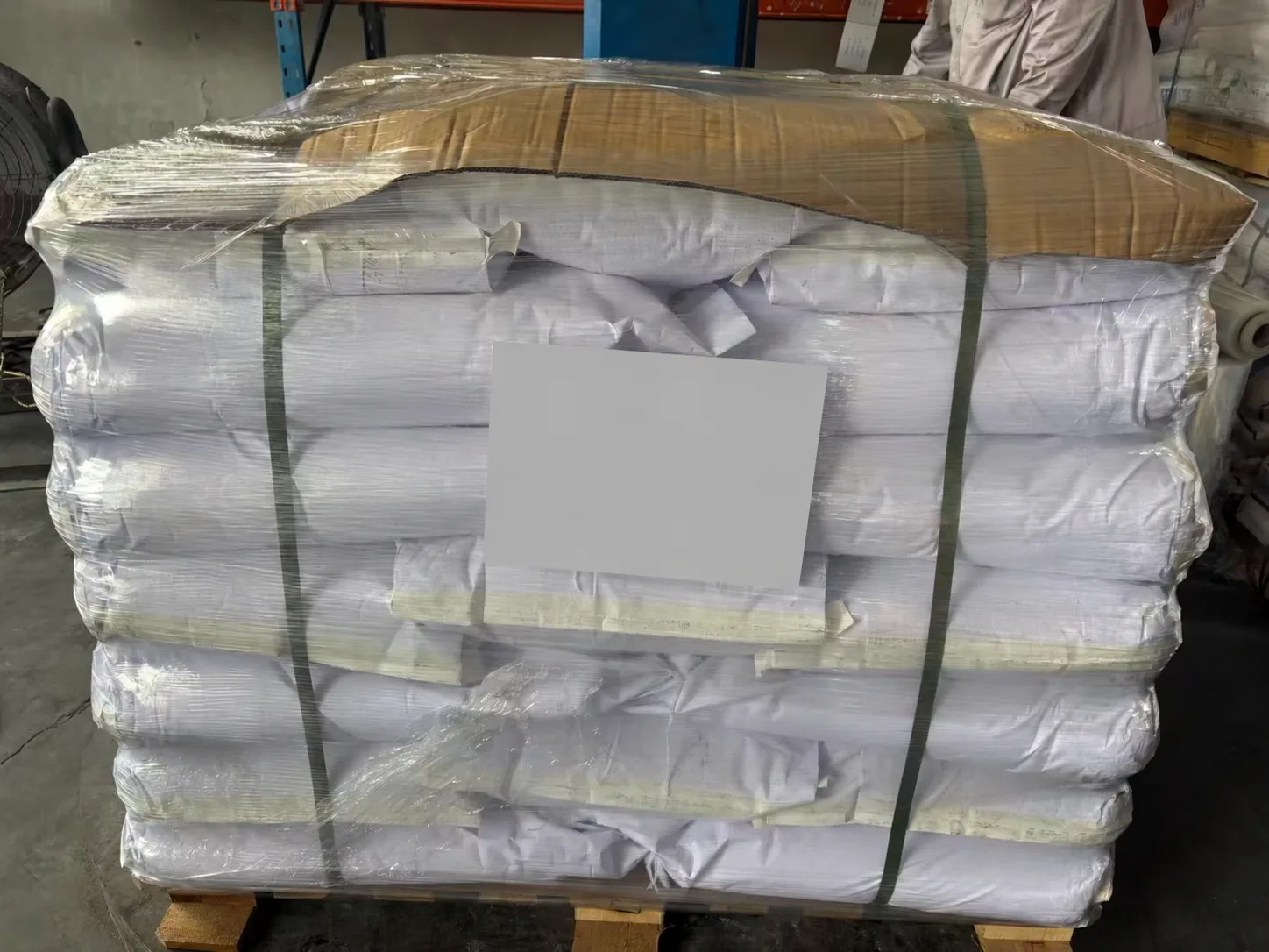 BFR-68 small bags stacked on a wooden pallet and secured with stretch wrap and straps; label obscured